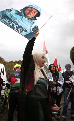 October 29, 2024, Shenstone, England, UK: A protester holds a sign highlighting the number of journalists killed during the war outside UAV Engines during the demonstration. Pro-Palestinian protesters keep up pressure on Israeli arms company Elbit Systems