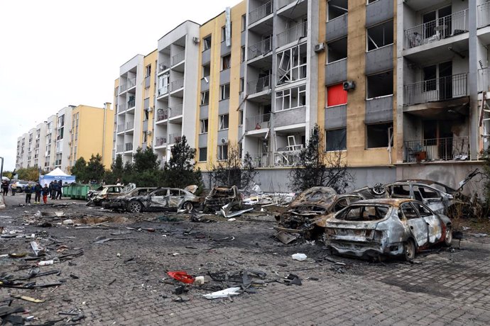 09 November 2024, Ukraine, Odesa: Burned-down cars are seen outside a residential building damaged by a Russian drone attack, Odesa, southern Ukraine. Photo: -/Ukrinform/dpa