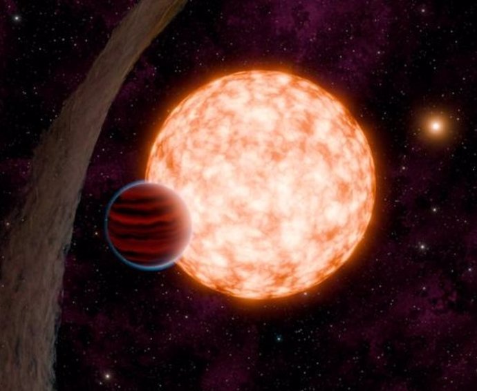 Una interpretación artística del sistema IRAS 04125+2902 (TIDYE-1). Las estrellas jóvenes como ésta están cubiertas de manchas estelares, regiones más frías que la superficie estelar circundante.