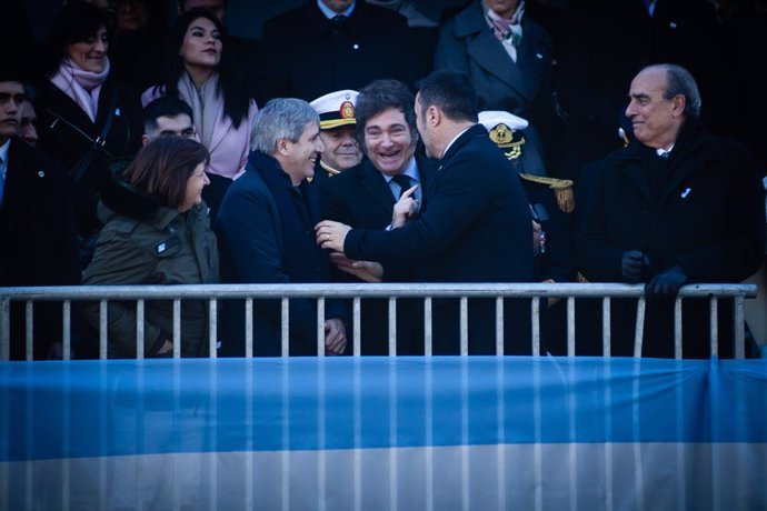 Archivo - July 9, 2024, Buenos Aires, Buenos Aires, Argentina: The 208th anniversary of Argentina's independence was commemorated with a massive military parade attended by national authorities. President Milei talking to Luis Caputo, Economy Minister (le