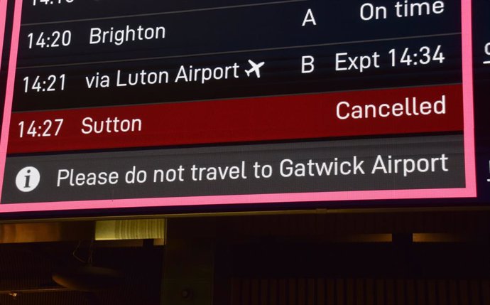 November 22, 2024, London, England, UK: A departure board at St Pancras International train station advises travellers not to go to Gatwick Airport following a security incident. 