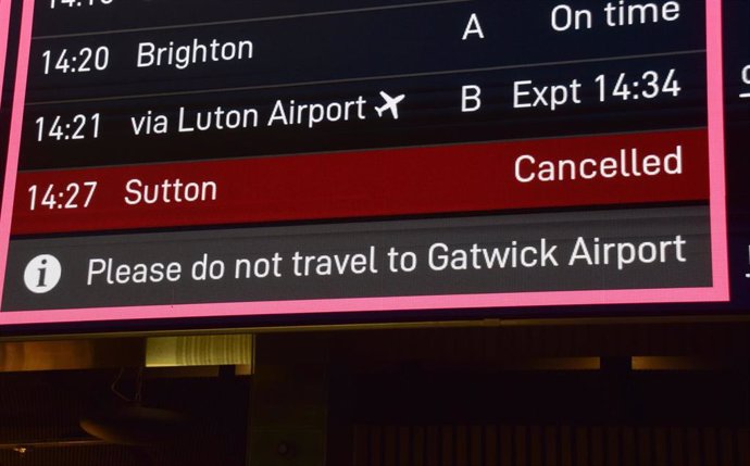 November 22, 2024, London, England, UK: A departure board at St Pancras International train station advises travellers not to go to Gatwick Airport following a security incident. 