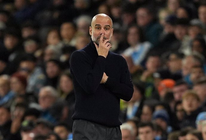 23 November 2024, United Kingdom, Manchester: Manchester City manager Pep Guardiola reacts on the touchline, during the English Premier League soccer match between Manchester City and Tottenham Hotspur at the Etihad Stadium. Photo: Martin Rickett/PA Wire/