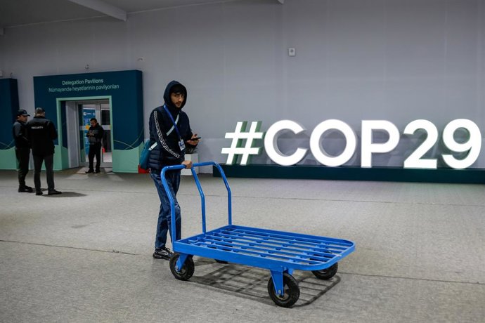 November 23, 2024, Baku, Azerbaijan: A serviceman pushes a trolley in Blue Zone during a closing ceremony after negotiations concluded in Nizami Plenary Room in Blue Zone during United Nations Climate Change Conference COP29, an event held by United Natio
