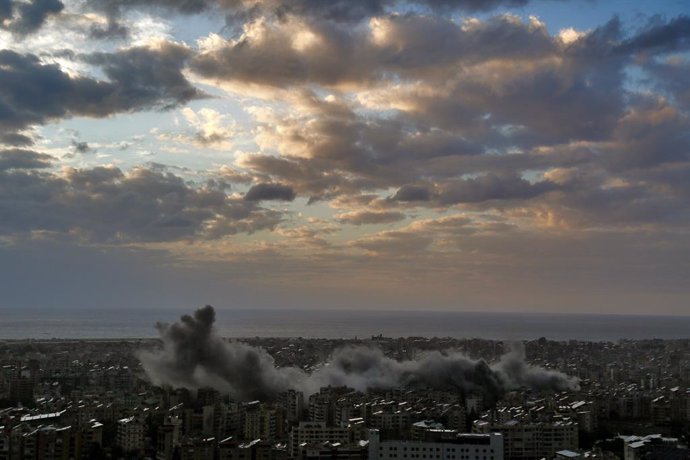 November 24, 2024, Beirut, Beirut, Lebanon: Black smoke billows from Israeli air strikes on Beirut southern suburb, a stronghold of pro-Iranian Hezbollah. Lebanese Prime Minister Najib Mikati accused Israel of rejecting all efforts to reach a ceasefire wi