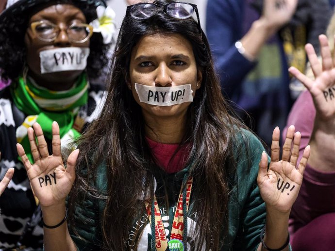 November 23, 2024, Baku, Azerbaijan: Activists stage a protest during a closing ceremony after negotiations concluded in Nizami Plenary Room in Blue Zone during United Nations Climate Change Conference COP29, an event held by United Nations Framework Conv