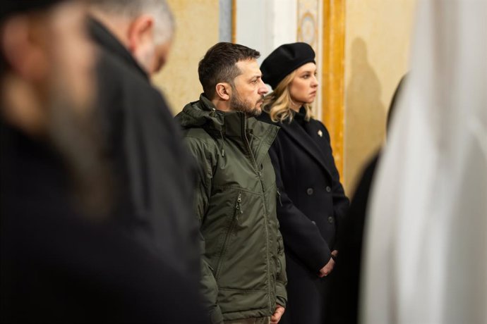 November 23, 2024, Kyiv, Ukraine: Ukrainian First Lady Olena Zelenska, right, and President Volodymyr Zelenskyy, left, stand during a multi-denominational prayer service honoring the victims of the Holodomor famine at the Holy Dormition Cathedral of the K