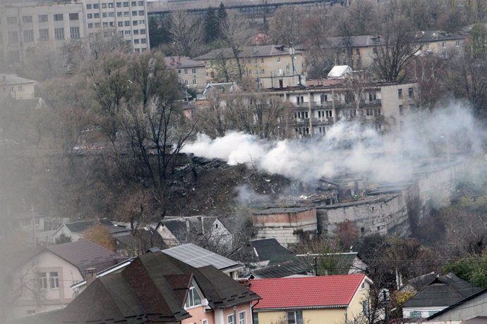 November 21, 2024, Dnipro, Ukraine: DNIPRO, UKRAINE - NOVEMBER 21, 2024 - A pillar of smoke rises over a garage cooperative damaged by the Russian missile strike, Dnipro, east-central Ukraine. On Thursday morning, November 21, Russians launched an interco