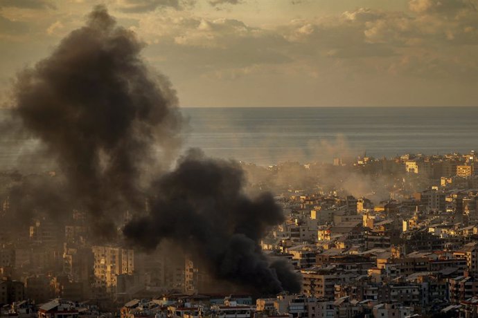 November 26, 2024, Beirut, Beirut, Lebanon: Smoke billows from Beirut southern suburb, a hotbed for pro-Iranian Hezbollah, following heavy Israeli air raids. Israeli security cabinet appears set to approve a ceasefire plan with Lebanon's Hezbollah as fina