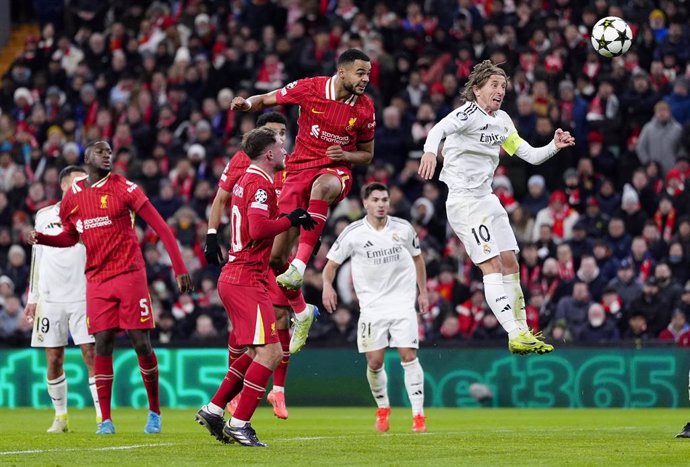 27 November 2024, United Kingdom, Liverpool: Liverpool's Cody Gakpo (3rd R) scores his side's second goal during the UEFA Champions League soccer match between Liverpool and Real Madrid at Anfield. Photo: Peter Byrne/PA Wire/dpa