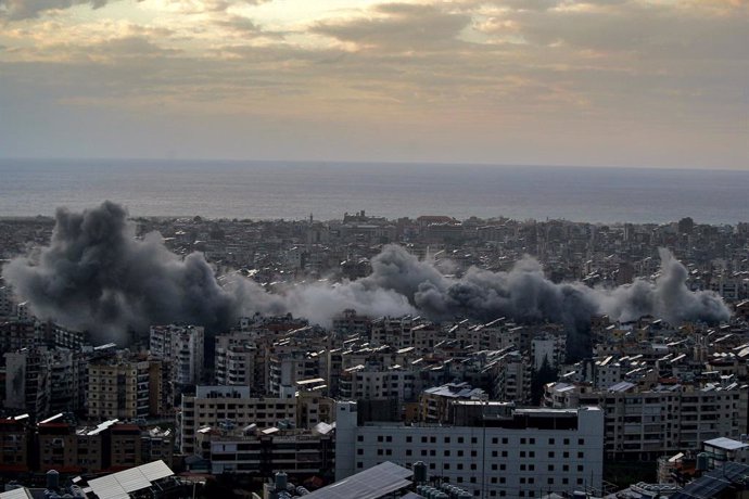 November 24, 2024, Beirut, Beirut, Lebanon: Black smoke billows from Israeli air strikes on Beirut southern suburb, a stronghold of pro-Iranian Hezbollah. Lebanese Prime Minister Najib Mikati accused Israel of rejecting all efforts to reach a ceasefire wi