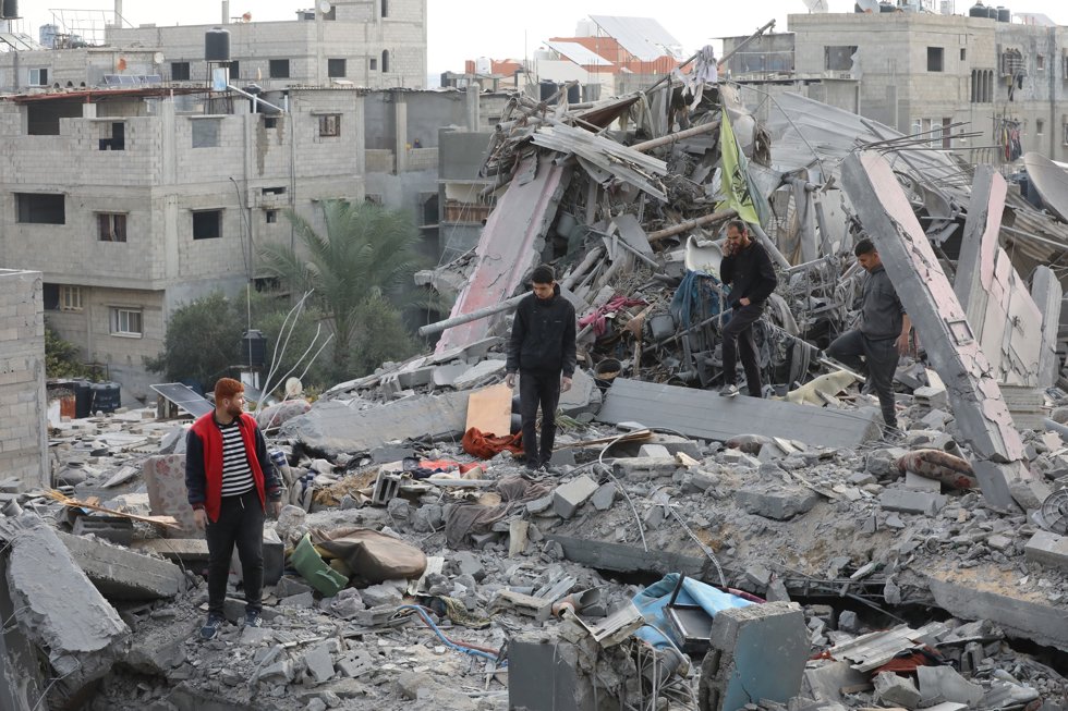 December 7, 2024, Nusaierat, Gaza Strip, Palestinian Territory: Palestinians inspect the rubble of destroyed buildings following Israeli airstrikes in Al Nuseirat refugee camp, central Gaza Strip, 07 December 2024.