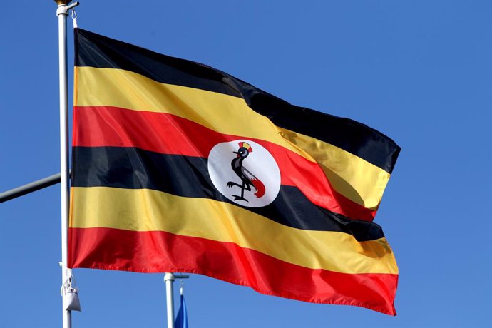 Archivo - June 9, 2024, Saint Petersburg, Russia: The flag of the Republic of Uganda seen in the gallery of flags of the participating countries in the framework of St. Petersburg International Economic Forum 2024