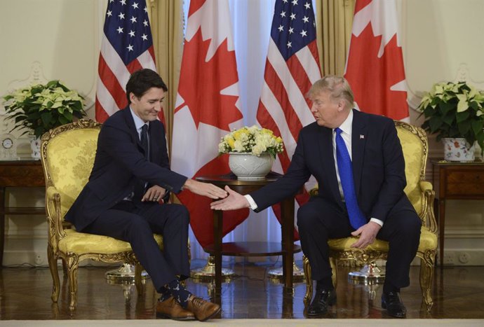 Archivo - December 3, 2019, London, England, Great Britain: Prime Minister Justin Trudeau meets U.S. President Donald Trump at Winfield House in London on Tuesday, Dec. 3, 2019.