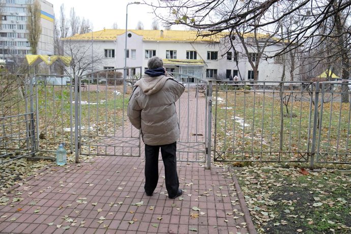 November 29, 2024, Kyiv, Ukraine: KYIV, UKRAINE - NOVEMBER 29, 2024 - A man looks at a family polyclinic in the Dniprovskyi district damaged by an overnight Russian drone attack, Kyiv, capital of Ukraine. On Friday night, November 29, falling drone debris