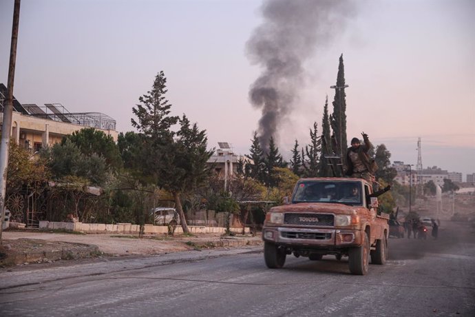 November 29, 2024, Aleppo, Aleppo Governorate, Syria: Aleppo, Syria. 29 November 2024. Syrian opposition forces enter Aleppo on military vehicles following the retreat of the Syrian government forces. The move is part of a military offensive launched by t