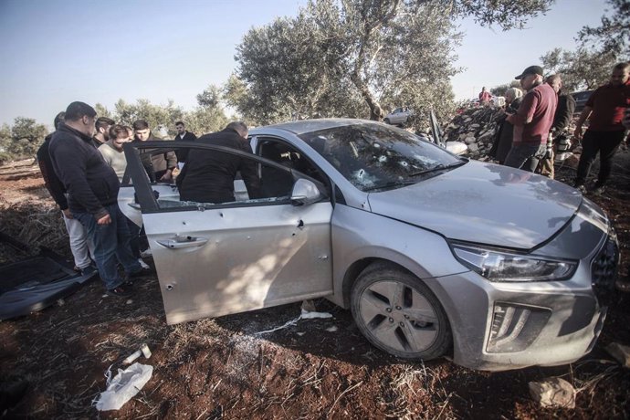 December 1, 2024, Jenin, West Bank, Palestine: Palestinians inspect a destroyed vehicle belonging to Palestinian militants. Israeli military forces blew up a hideout where four Palestinian militants were holed up in the village of Sa'ir, south of the city