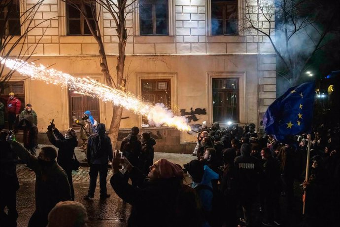 November 29, 2024, Tbilisi, Georgia: Protesters shoot fireworks at the riot police outside Parliament House during an anti-government protest. Following a controversial election last month, ruling party ''Georgian Dream'' Prime Minister Irakli Kobakhidze 