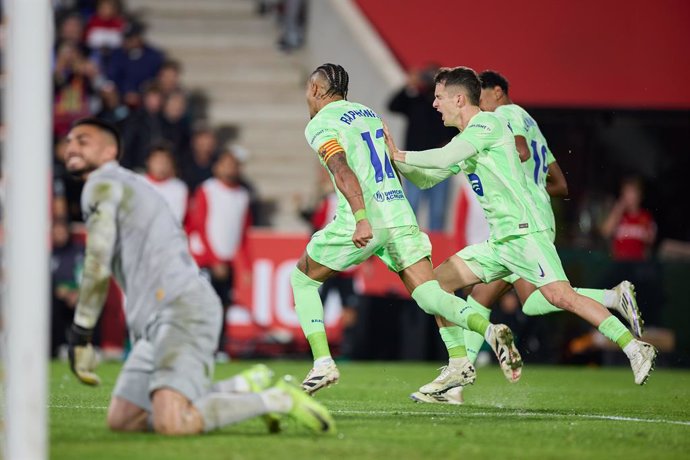 Raphael Dias Belloli 'Raphinha' of FC Barcelona celebrates after scoring goal during the LaLiga EA Sports match between RCD Mallorca and FC Barcelona at Son Moix on December 3, 2024, in Palma, Spain.