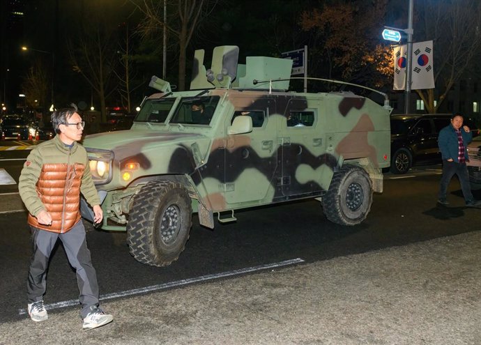 December 4, 2024, Seoul, South Korea: Military vehicles are seen outside of the National Assembly in Seoul. South Korea's President Yoon Suk Yeol on December 3 declared martial law.,Image: 942679070, License: Rights-managed, Restrictions: , Model Release: