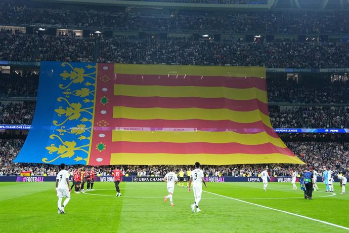A flag of Valencia is seen in support of the victims of DANA in Valencia during the UEFA Champions League 2024/25 League Phase MD4 match between Real Madrid CF and AC Milan at Estadio Santiago Bernabeu on November 5, 2024, in Madrid, Spain.