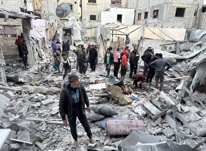 December 5, 2024, Nuseirat, Gaza Strip, Palestinian Territory: Palestinians inspect the buildings destroyed or damaged after Israeli attack on Nuseirat Refugee Camp in Gaza City, Gaza on December 5, 2024