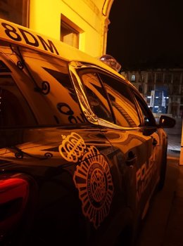 Archivo - Vehículo policía nacional de noche Málaga