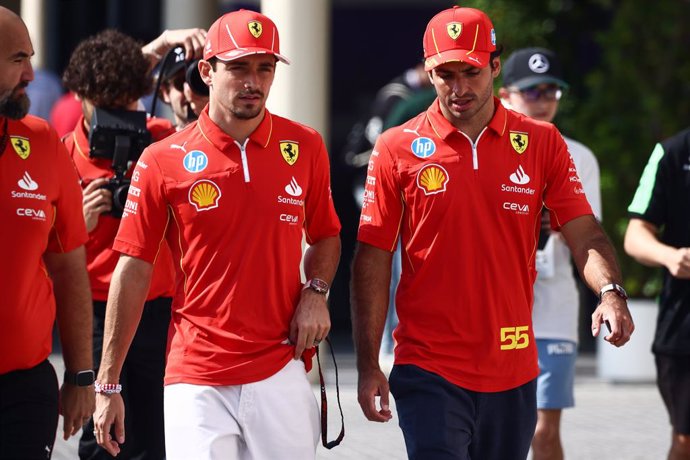 07 December 2024, United Arab Emirates, Abu Dhabi: (R-L) Carlos Sainz and Charles Leclerc of Ferrari arrive in the paddock ahead of Formula 1 Abu Dhabi Grand Prix at Yas Marina Circuit. Photo: Beata Zawrzel/ZUMA Press Wire/dpa