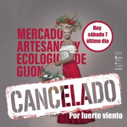 Cartel anunciando la cancelación del Mercado Artesano y Ecológico de Gijón ante la previsión de fuertes vientos