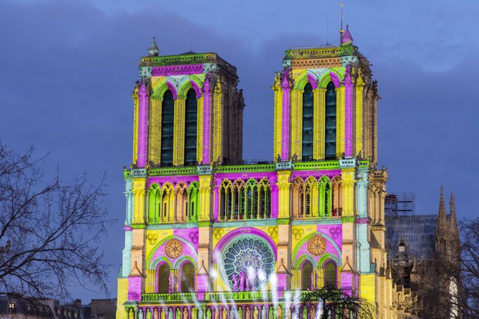 December 6, 2024, Paris, France, France: Paris, France December 6, 2024 - A light show is projected onto the facade of Notre Dame Cathedral as part of the preparations for the opening ceremony.