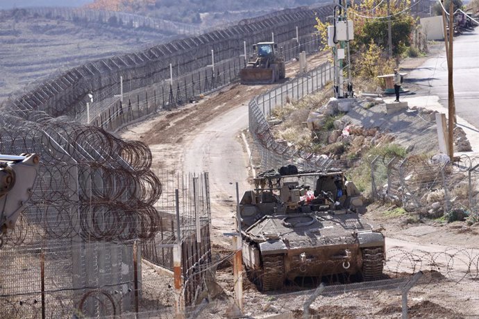 GOLAN HEIGHTS, Dec. 9, 2024  -- Israeli troops are seen near the buffer zone in the Golan Heights, on Dec. 9, 2024. The Israeli army has seized control of areas near the border and struck strategic weapons in Syria as of Monday, according to Syrian and Is