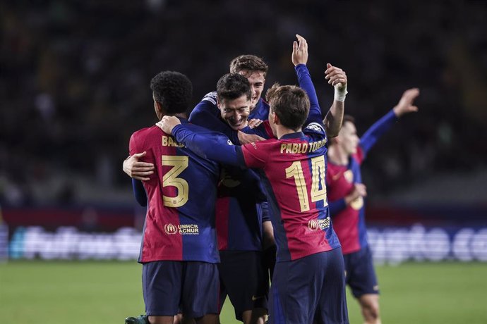 Robert Lewandowski of FC Barcelona celebrates a goal with his teammates during the UEFA Champions League 2024/25 League Phase MD5, match between FC Barcelona and Stade Brestois 29 at Estadi Olimpic Lluis Companys on November 26, 2024 in Barcelona, Spain.