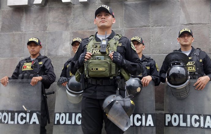 LIMA, Nov. 13, 2024  -- Police officers guard outside the Lima Convention Center ahead of the 31st APEC Economic Leaders' Meeting in Lima, Peru, Nov. 12, 2024.