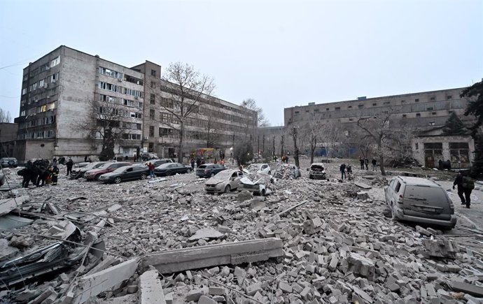 December 10, 2024, Zaporizhzhia, Ukraine: ZAPORIZHZHIA, UKRAINE - DECEMBER 10, 2024 - The rubble covers the ground after a Russian missile strike, Zaporizhzhia, southeastern Ukraine. Three people are dead and at least 14 people are injured. An office buil