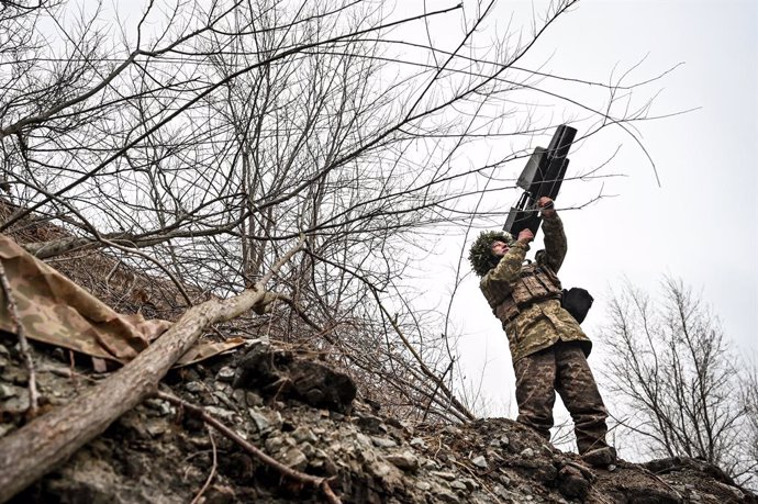 December 3, 2024, Ukraine: UKRAINE - DECEMBER 3, 2024 - A serviceman of a self-propelled howitzer crew of Ukraine's 118th Separate Mechanized Brigade uses an anti-drone rifle while on a mission in the Zaporizhzhia direction, southeastern Ukraine.