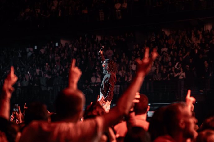 El grup musical Arde Bogotá durant la seua actuació en el WiZink Center (arxiu)