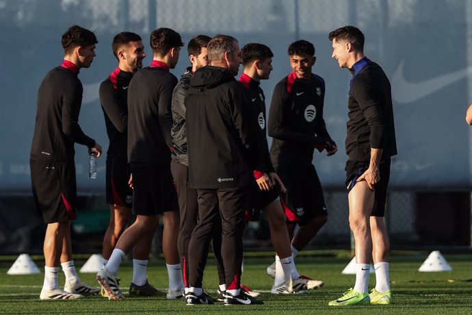 Robert Lewandowski and Hansi Flick, head coach during the training day of FC Barcelona ahead the Spanish League, La Liga EA Sports, football match against UD Las Palmas at Ciudad Esportiva Joan Gamper on December 06, 2024 in Sant Joan Despi, Barcelona, Sp