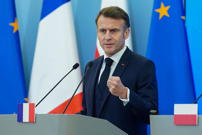 December 12, 2024, Warsaw, Poland: President of France EMMANUEL MACRON gestures as he speaks to the media during a press conference. Donald Tusk and Emmanuel Macron held a meeting to discuss further support for Ukraine, international developments, and the