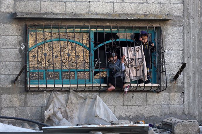 December 19, 2024, Maghaz, Gaza Strip, Palestinian Territory: Palestinians inspect the rubble of destroyed buildings following Israeli airstrikes in Al-Maghazi refugee camp, central Gaza Strip, 19 December 2024