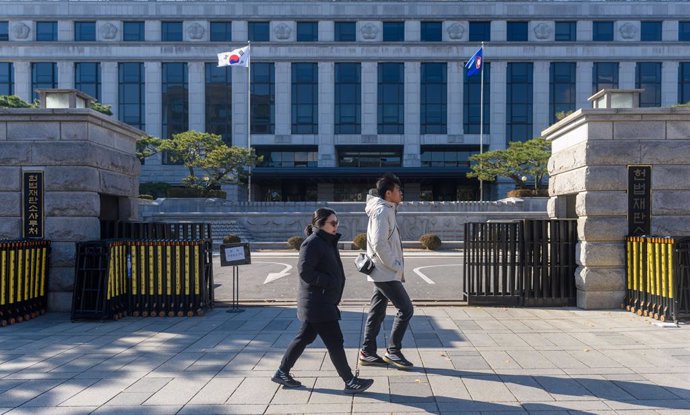 December 15, 2024, Seoul, South Korea: People walk past the Constitutional Court in Seoul. All eyes are now on the South Korea's Constitutional Court, which holds the final decision on President Yoon Suk Yeol's impeachment, after parliament voted December