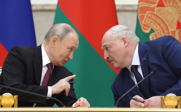 December 6, 2024, Minsk, Belarus: Russian President Vladimir Putin, left, speaks with Belarus President Alexander Lukashenko, right, during a signing ceremony at the conclusion of the Supreme State Council of the Union State of Russia and Belarus, Decembe