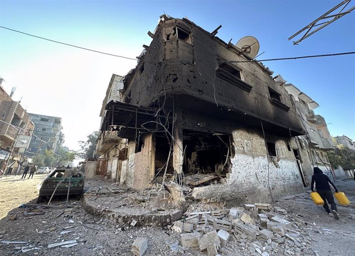 December 23, 2024, Nuseirat, Gaza Strip, Palestinian Territory: Palestinians check the damage following Israeli strikes in Nuseirat refugee camp in the central Gaza Strip, on December 23, 2024, amid the ongoing war between Israel and Hamas militants