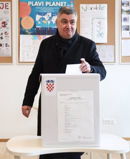 ZAGREB, Dec. 29, 2024  -- Croatia's incumbent President Zoran Milanovic votes for the Croatian presidential election at a polling station in Zagreb, Croatia, on Dec. 29, 2024. Voting for the Croatian presidential election began at 7 a.m. (0600 GMT) on Sun