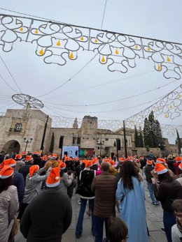 Archivo - 'Campanadas con naranja' en Palma del Río en una imagen de archivo.