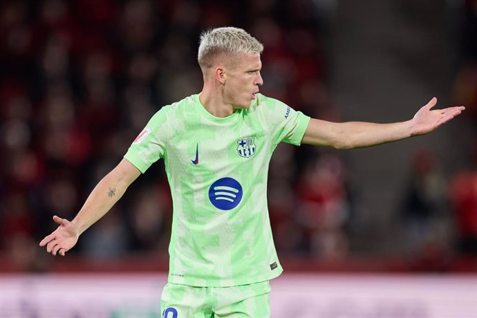 Dani Olmo of FC Barcelona reacts during the LaLiga EA Sports match between RCD Mallorca and FC Barcelona at Són Moix on December 3, 2024, in Palma, Spain.