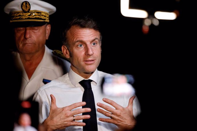 19 December 2024, France, Mamoudzou: French President Emmanuel Macron speaks after a meeting with local representatives in Mamoudzou. Angry residents of Mayotte, the French overseas territory hit by a cyclone, confronted French President Emmanuel Macron d