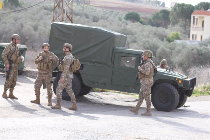 KHIAM, Dec. 12, 2024  -- Lebanese troops are seen during their advance to Khiam, Lebanon, Dec. 11, 2024. Lebanese army units, accompanied by the United Nations peacekeepers, deployed Wednesday afternoon to five positions around Khiam, a town in the easter