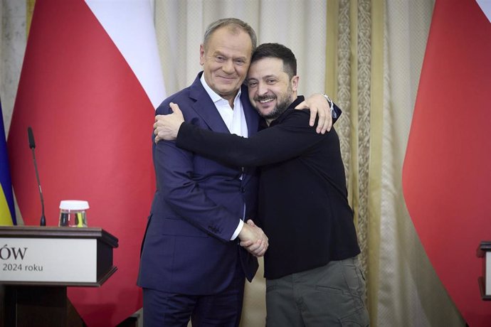 December 17, 2024, Lviv, Lviv Oblast, Ukraine: Polish Prime Minister Donald Tusk, left, embraces Ukrainian President Volodymyr Zelenskyy, right, following a joint press conference, December 17, 2024 in Lviv, Ukraine.