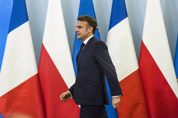 December 12, 2024, Warsaw, Masovian Voivodeship, Poland: President of France, Emmanuel Macron appears at a press conference with Prime Minister Donald Tusk (not in view).  