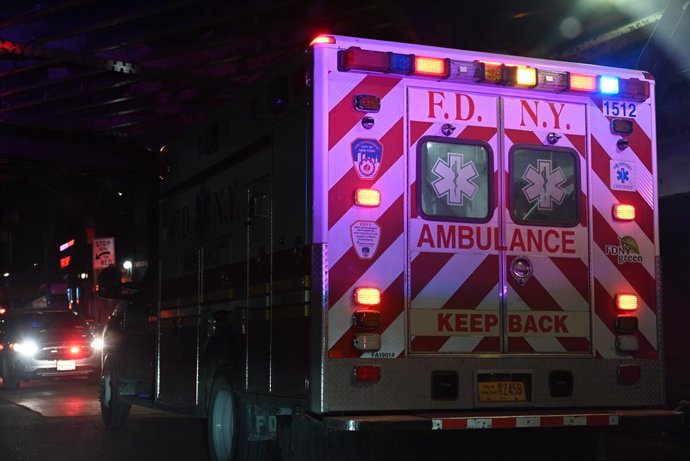 December 22, 2024, Woodside, New York, United States: The two men who were stabbed on the southbound 7 train are being rushed to the hospital at Woodside Avenue and 61st Street MTA subway station in the Woodside neighborhood of Queens. Sunday morning at a